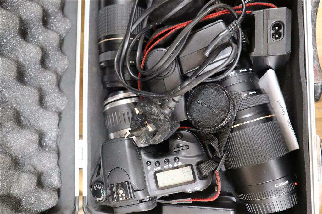 Two Canon EOS 20D digital cameras, lenses, flash guns and chargers and a Canon 350D digital camera